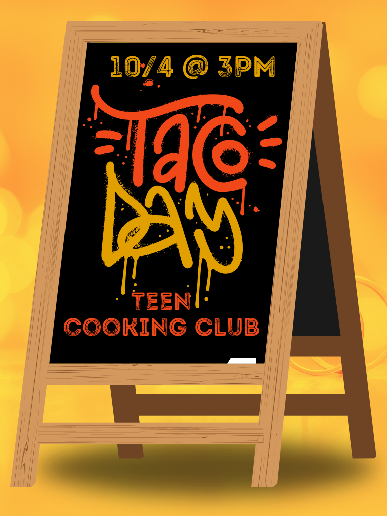 sandwich board which reads "Taco Day"