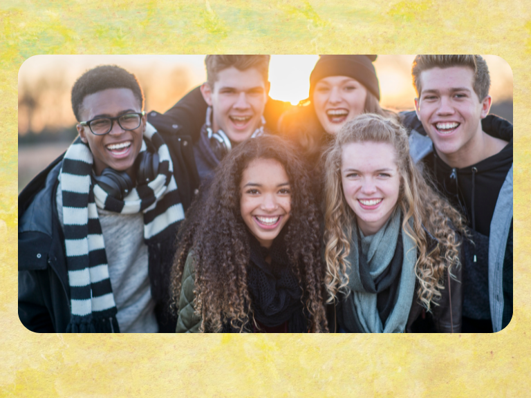 Photo of smiling teens. 